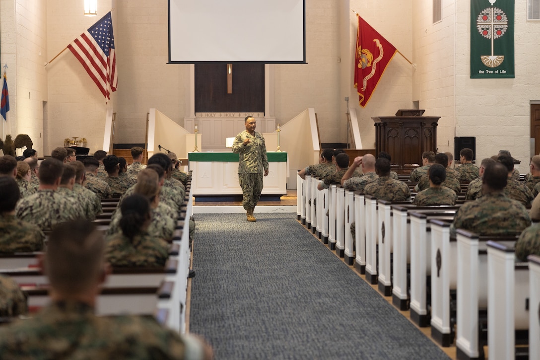 U.S. Navy Master Chief Petty Officer Delbert Terrell Jr., Fleet Master Chief of Personnel, Manpower, and Training, speaks to Sailors from across Camp Lejeune at the Protestant Chapel on Camp Lejeune, North Carolina, July 25, 2024. Terrell visited Camp Lejeune to meet with leaders, tour the 2nd Marine Logistics Group Human Performance Center, and speak to Sailors across II Marine Expeditionary Force. (U.S. Marine Corps photo by Lance Cpl. Franco Lewis)