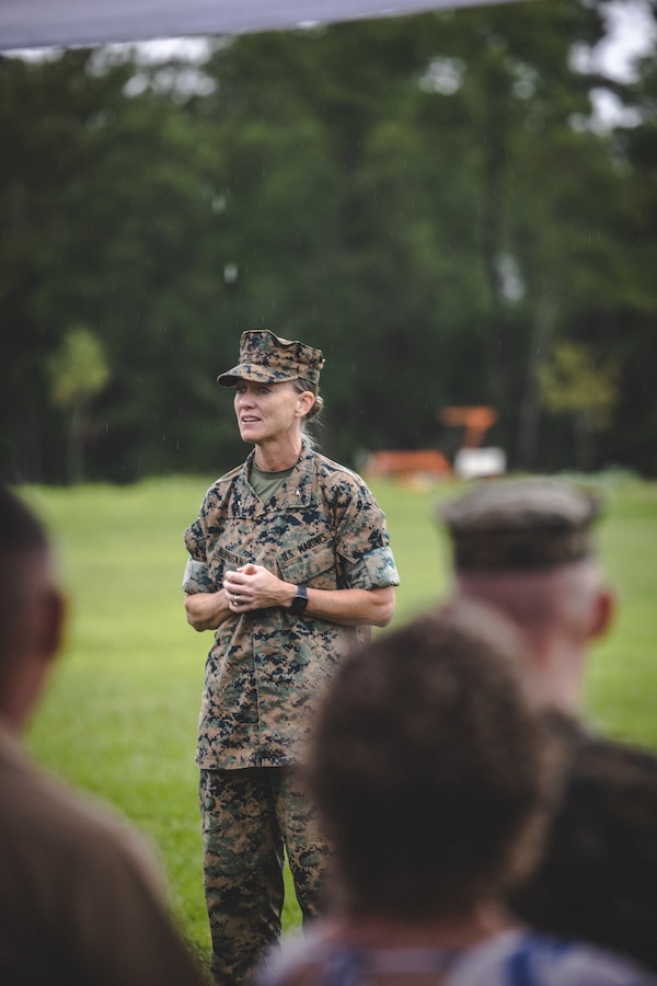 U.S. Marine Corps Brig. Gen. Maura M. Hennigan, commanding general, 2nd Marine Logistics Group, gives a speech during a change of command ceremony on Camp Lejeune, North Carolina, July 26, 2024. During the ceremony, U.S. Marine Corps Lt. Col. Brian T. Everett relinquished command of Headquarters and Service Battalion to Lt. Col. Chad T. Phillips. (U.S. Marine Corps photo by Cpl. Meshaq Hylton)