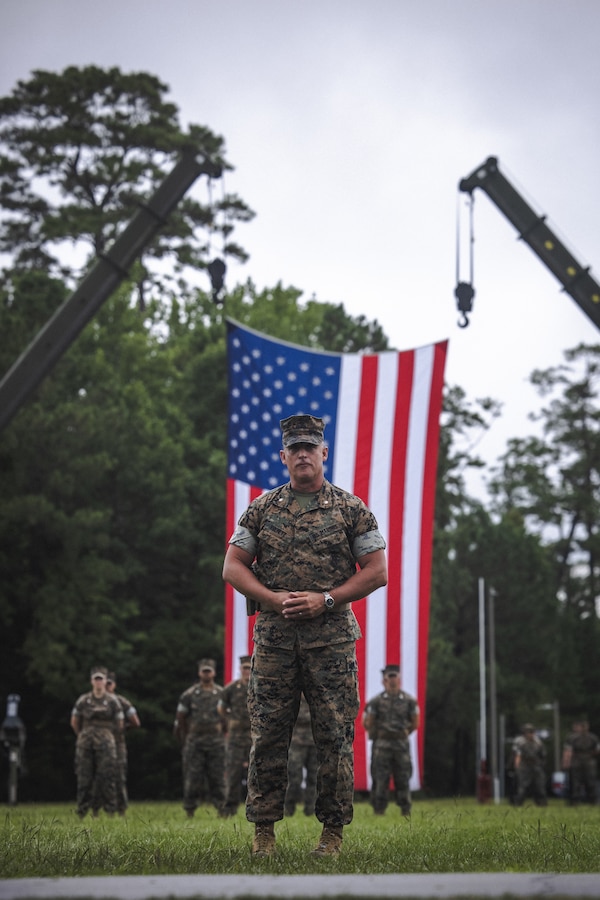 U.S. Marine Corps Lt. Col. Brian T. Everett, outgoing commanding officer, Headquarters and Service Battalion, 2nd Marine Logistics Group, gives a speech during a change of command ceremony on Camp Lejeune, North Carolina, July 26, 2024. During the ceremony, U.S. Marine Corps Lt. Col. Everett relinquished command of Headquarters and Service Battalion to Lt. Col. Chad T. Phillips. (U.S. Marine Corps photo by Cpl. Meshaq Hylton)