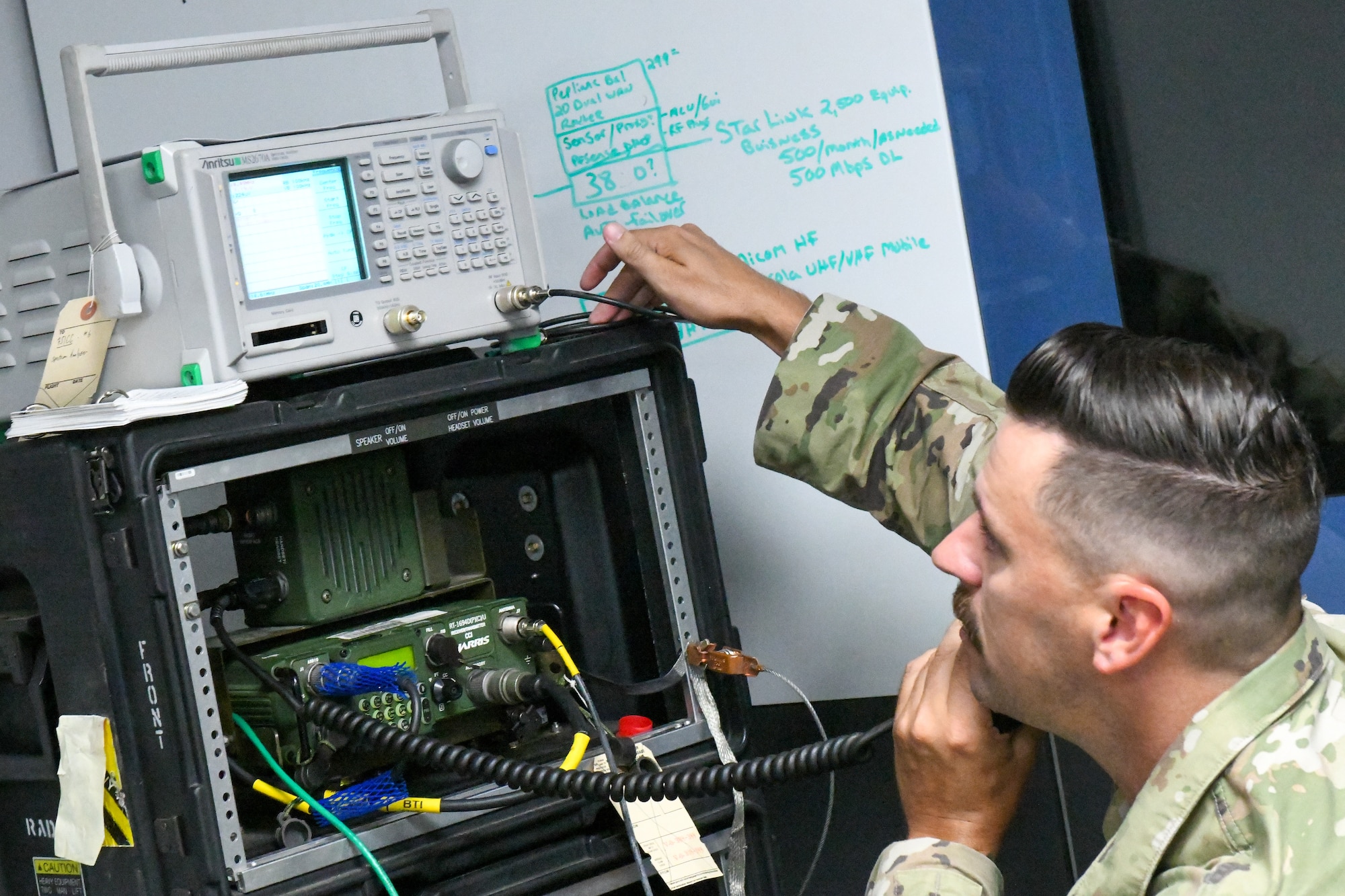Tech. Sgt. Joshua Powell, 910th Communications Squadron citizen Airman, uses a high-frequency radio during the U.S. Army Networks Command High-Frequency Skills Competition at Youngstown Air Reserve Station, Ohio, July 25, 2024.