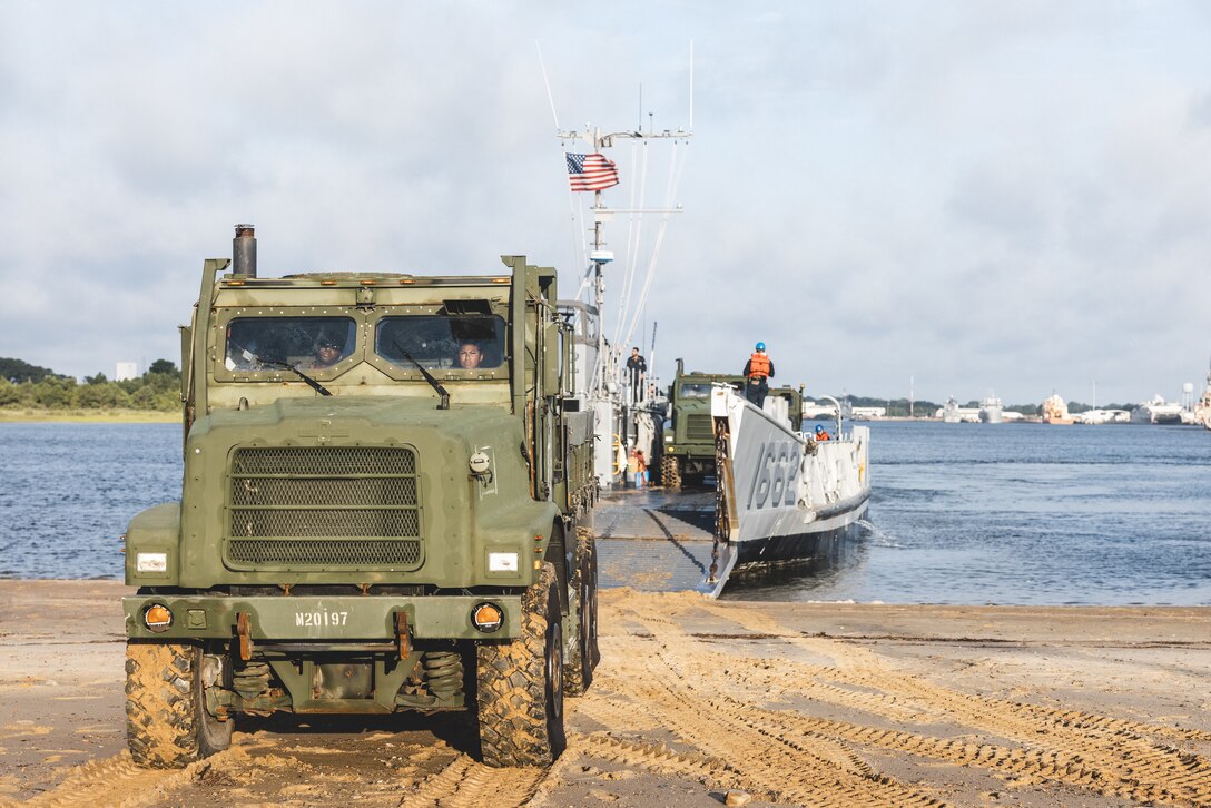 U.S. Marines Embark Tactical Vehicles Aboard Landing Craft Utilities