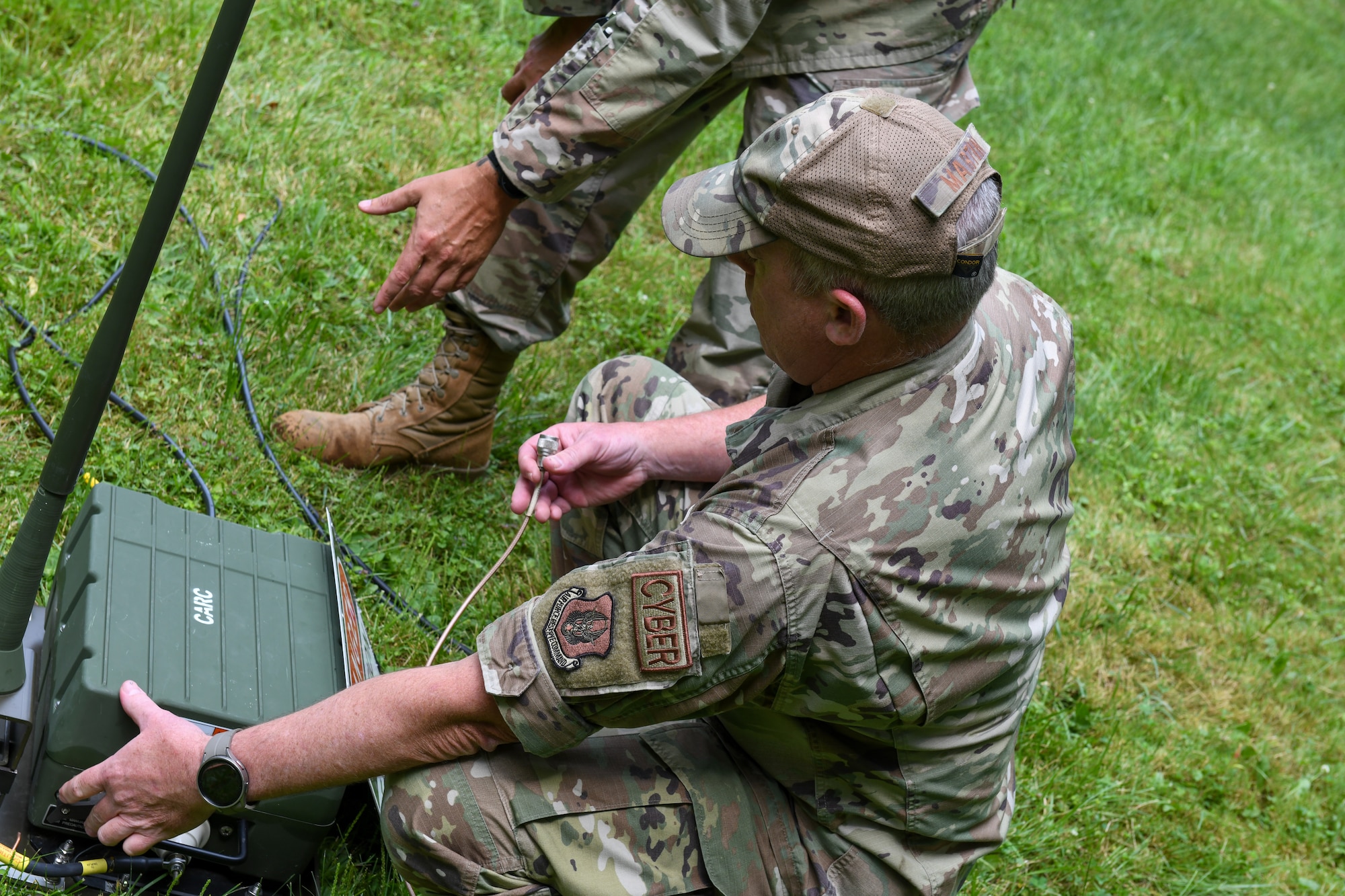 Master Sgt. Gilbert Martin, 910th Communications Squadron exercise and planning noncommissioned officer in charge, readies a communications device during the U.S. Army Networks Command High-Frequency Skills Competition at Youngstown Air Reserve Station, Ohio, July 25, 2024.