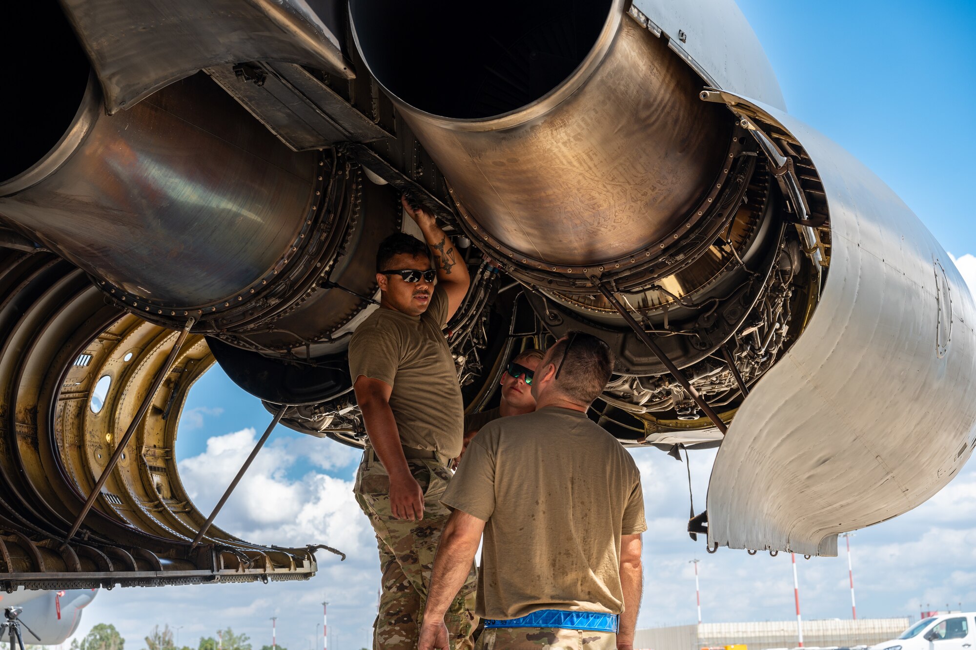U.S. Air Force maintainers, deployed from Barksdale Air Force Base, La., inspect the inside of an engine cowling on a B-52H Stratofortress at Mihail Kogălniceanu Air Base, Romania, during Bomber Task Force Deployment 24-4, July 22, 2024.