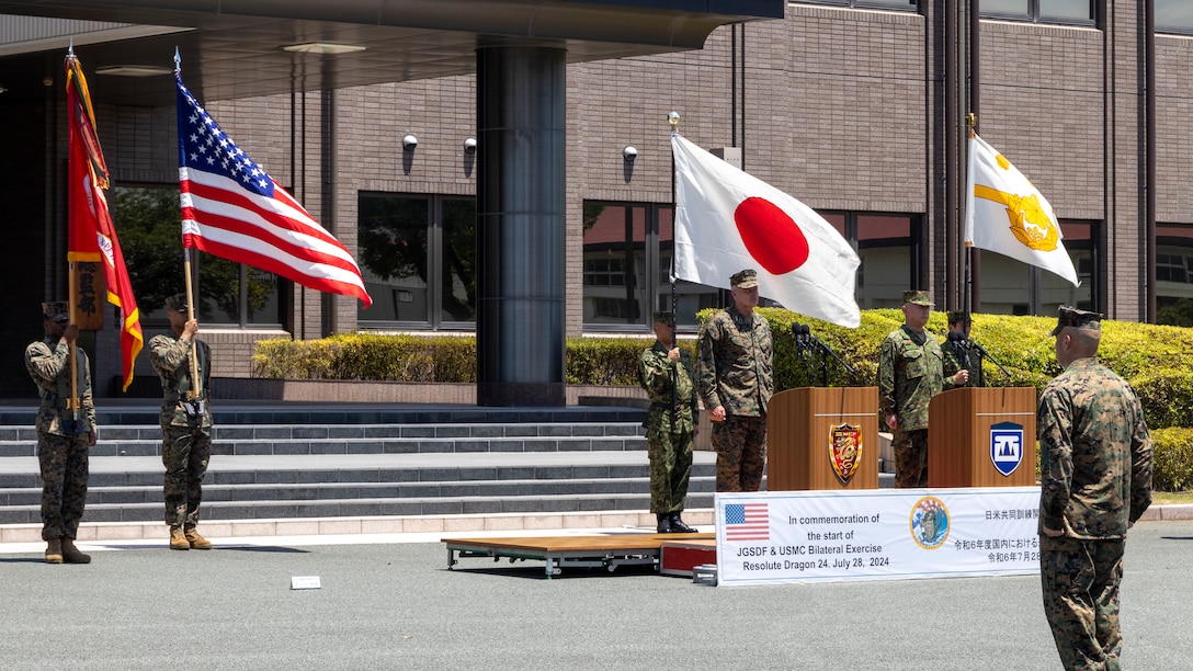 U.S. Marines with III Marine Expeditionary Force and members of the Japan Ground Self-Defense Force participate in an opening ceremony for exercise Resolute Dragon 24 at Japan Ground Self-Defense Force Camp Kengun, Kumamoto, Japan, July 28, 2024. Resolute Dragon 24 is an annual bilateral exercise in Japan that strengthens the command, control, and multi-domain maneuver capabilities of U.S. Marines in III Marine Expeditionary Force and Japan Self-Defense Force personnel, with a focus on controlling and defending key maritime terrain. (U.S. Marine Corps photo by Lance Cpl. Manuel Alvarado)
