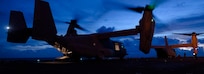 U.S. Marine Corps MV-22B Ospreys assigned to Marine Medium Tiltrotor Squadron 262 (Rein.), 31st Marine Expeditionary Unit, prepare for takeoff during night flight operations aboard the amphibious assault ship USS America (LHA 6) on July 25, 2024.