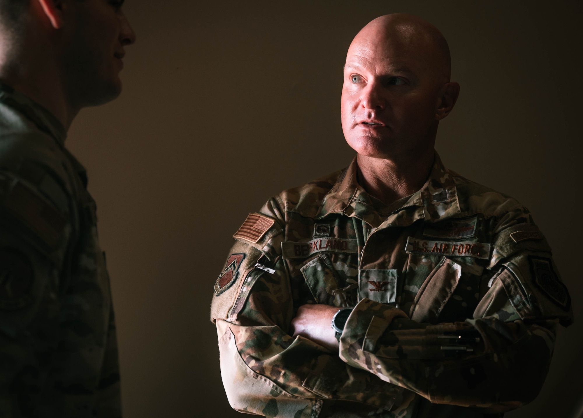 Col. Dave Berkland speaks to Airmen