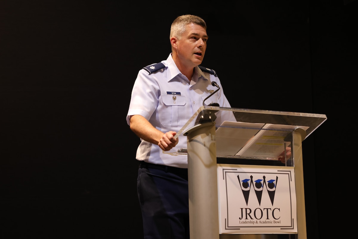 Lt. Col. Matthew Tipton delivers opening remarks at the Junior ROTC Leadership and Academic Bowl