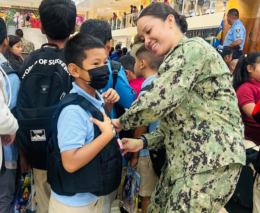 HAGÅTÑA, Guam (May 14, 2024) – Sailors from U.S. Naval Base Guam’s (NBG) Navy Security Forces (NSF) and special agents from the Naval Criminal Investigative Service (NCIS) Participated in the Guam Police Department (GPD) Police Week Static Display at Agana Shopping Center, May 13.