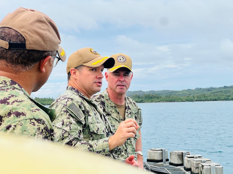 NAVAL BASE GUAM (June 6, 2024) – U.S. Naval Base Guam (NBG) Commanding Officer Capt. John Frye discusses the strategic importance of the base’s wharves and piers with Commander, Navy Installations Command Vice Adm. Scott Gray, June 5.