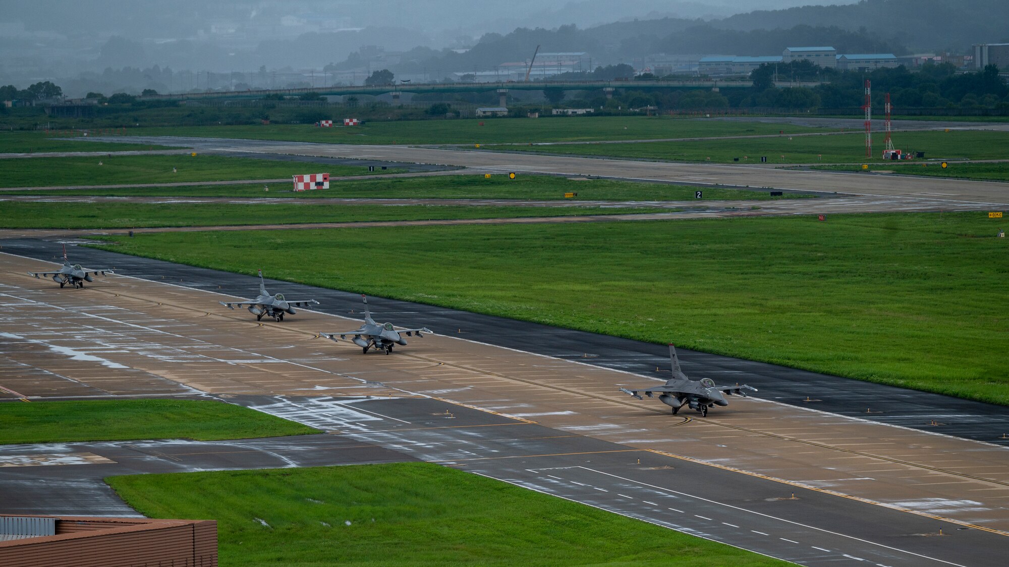 U.S. Air Force F-16 Fighting Falcons assigned to the 36th Fighter Squadron, taxi the runway at Osan Air Base, Republic of Korea, July 24, 2024. The 36th FS provides security for the ROK by consistently training to deter and defend against adversaries. (U.S. Air Force photo by Senior Airman Sabrina Fuller-Judd)