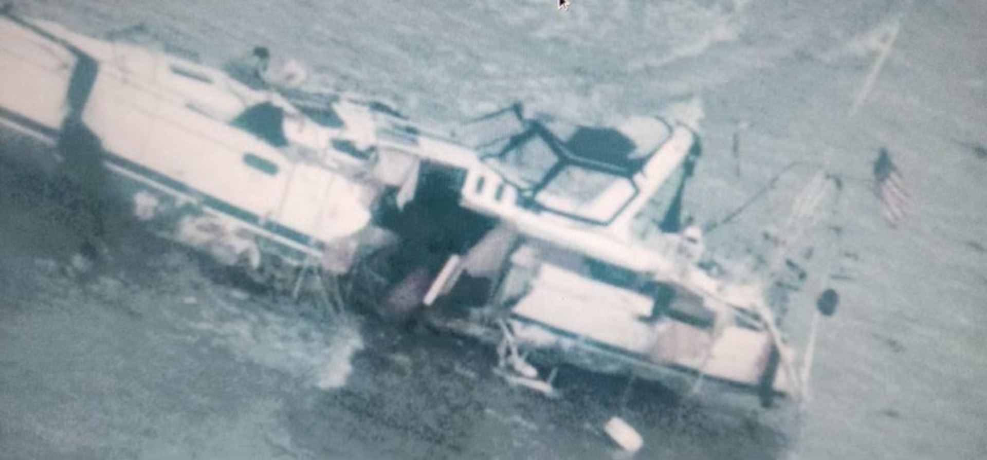 A U.S. Coast Guard Air Station Barbers Point HC-130J Super Hercules Air Crew spots the sailing vessel Espiritu aground on the East side of Fanning Island near Kiribati, July 28, 2024. The U.S. Coast Guard assisted Kiribati search and rescue coordination officials with the search for the sailing vessel Espiritu after an EPIRB transmitted a distress signal near the Republic of Kiribati.