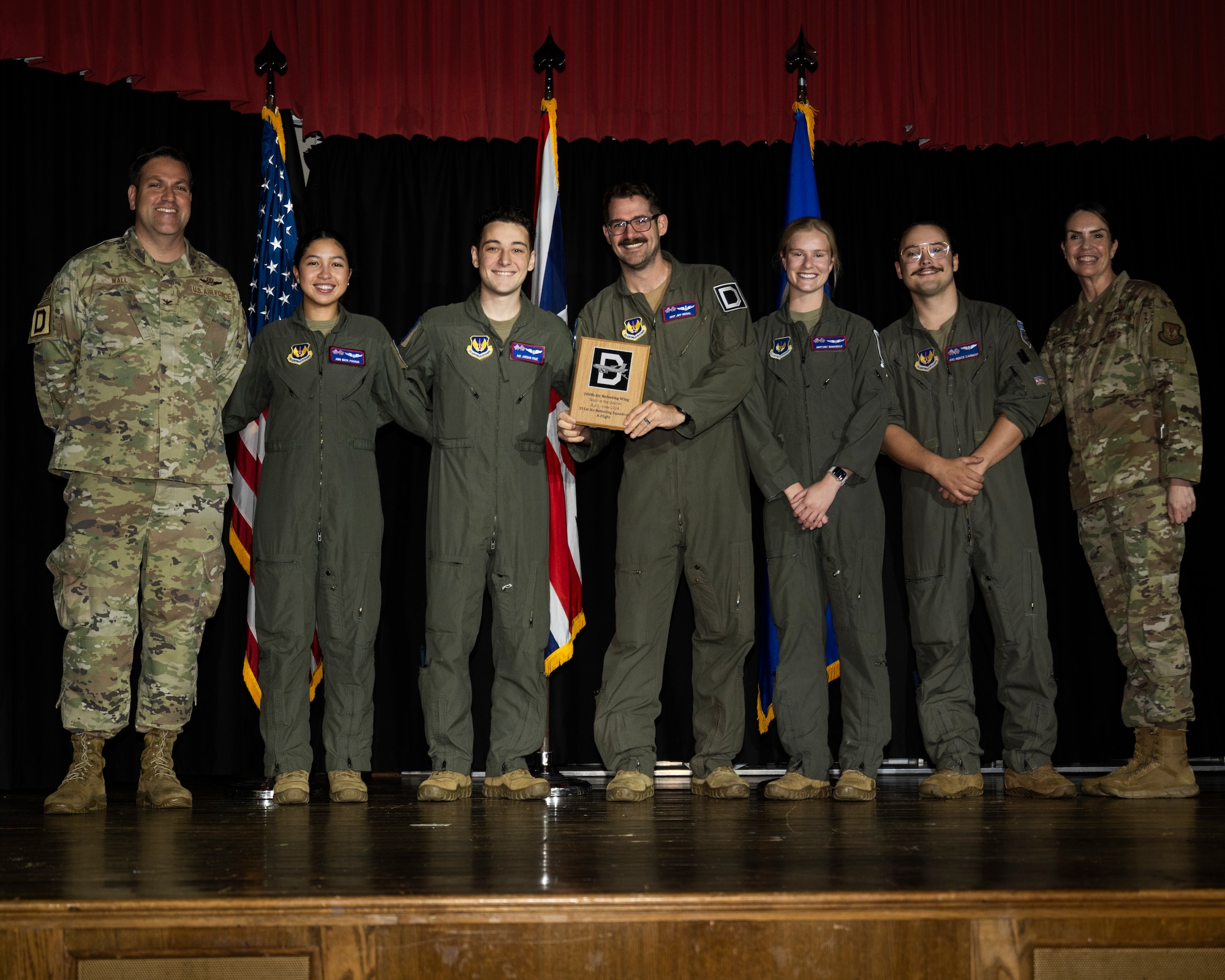 U.S. Airmen assigned to the 351st Air Refueling Squadron “A-Flight" pose for a group photo after winning “Team of the Quarter” during a 100th Air Refueling Wing’s second quarter awards ceremony at Royal Air Force Mildenhall, England, July 26, 2024.