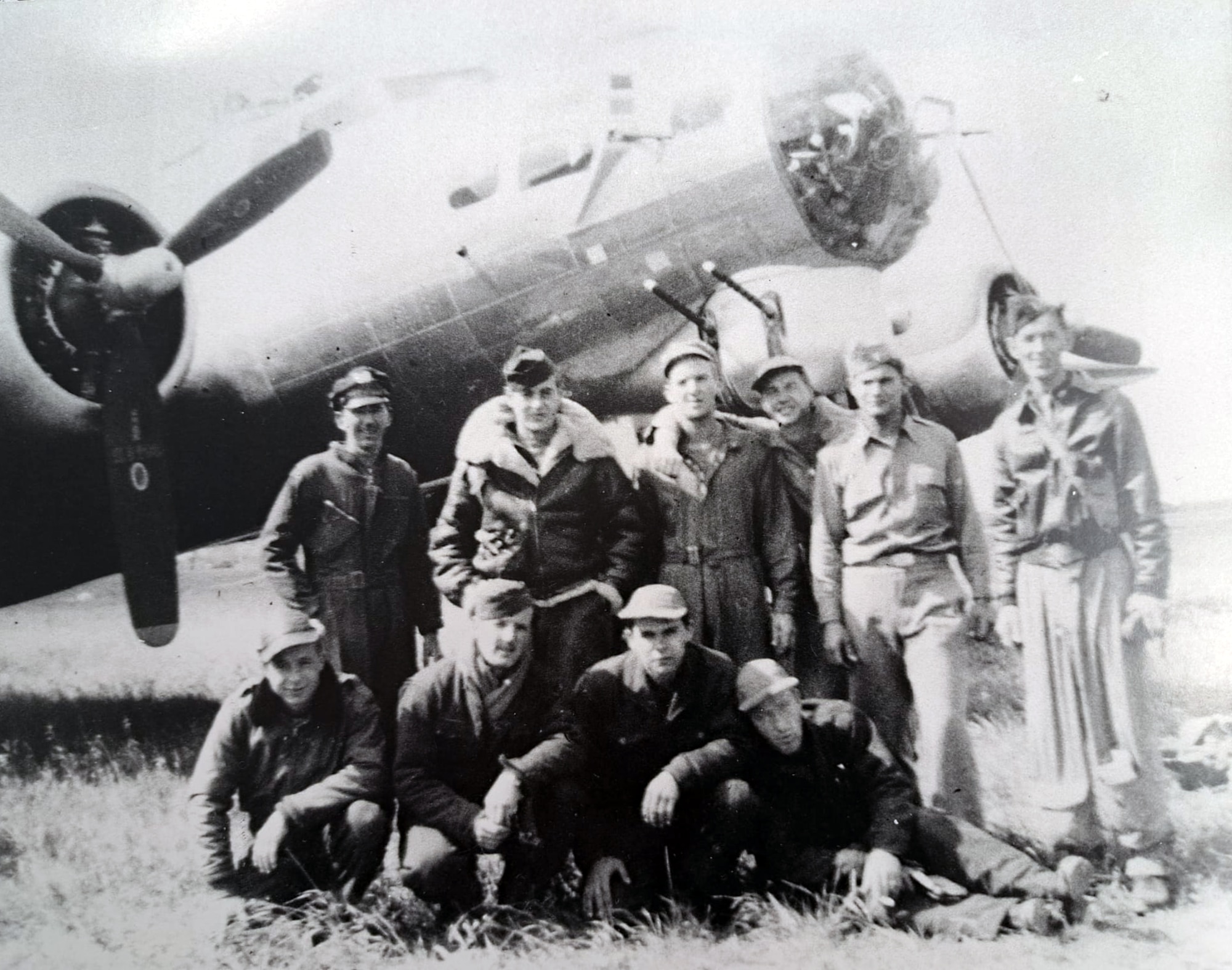 The crew of “Little Boy Blue” pose for a photo by their B-17 Flying fortress in 1944. Little Boy Blue crashed in a field in Suffolk, England, after a mid-air collision caused the fuselage to be ripped in half. Exactly 80 years later, on July 19, 2024, a memorial service was held near the crash site to pay tribute to the crew, with their families in attendance. (Courtesy photo from Cotswold Archaeology)