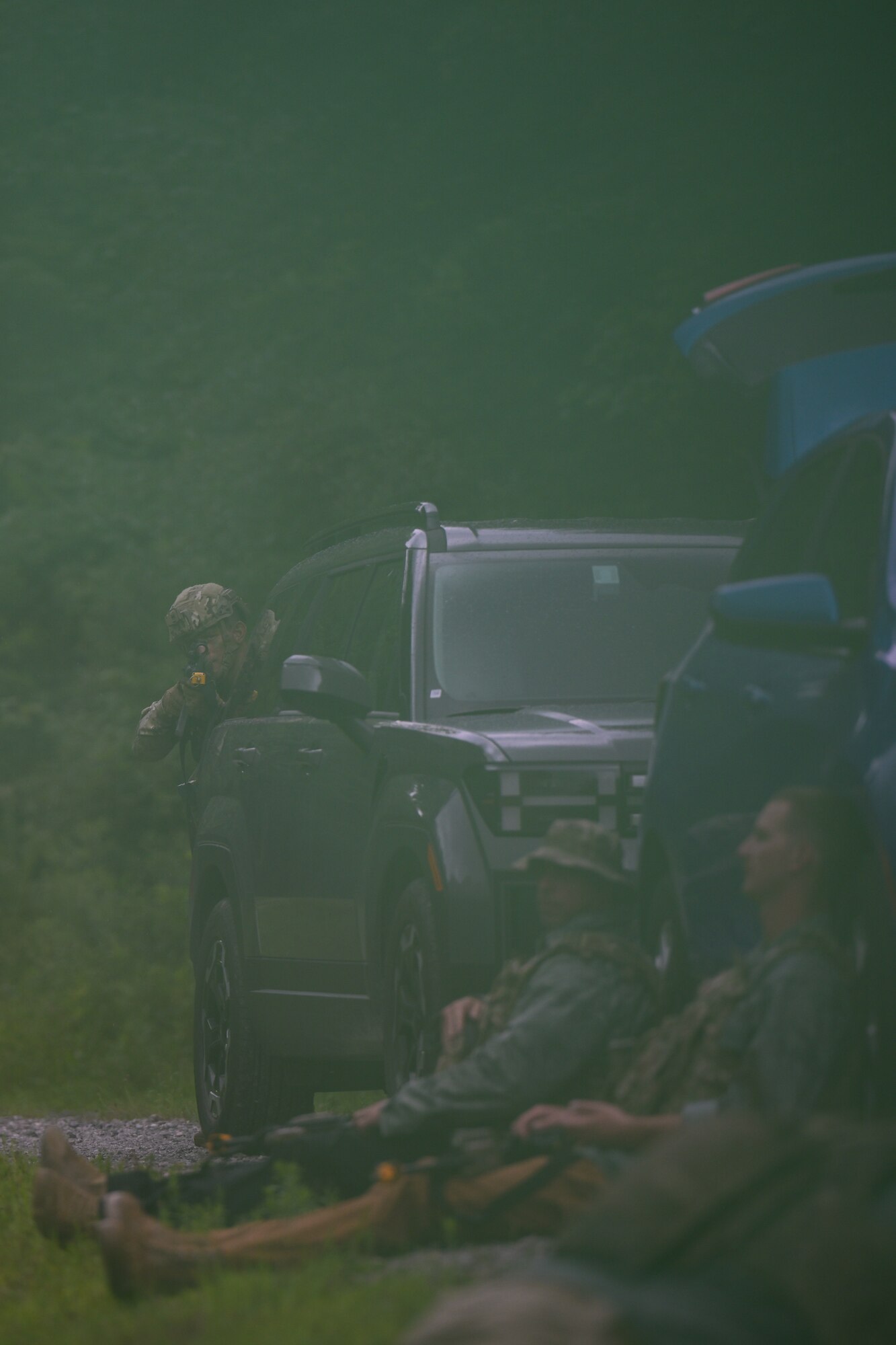 Integrated Defense Leadership Course students move on opposing force members during an area security operations exercise at Camp James A. Garfield Joint Military Training Center, Ohio, July 25, 2024.