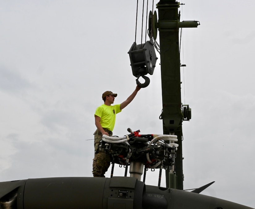 U.S. Soldiers with the Pennsylvania National Guard move a UH-60 Black Hawk helicopter onto a flatbed truck at Fort Indiantown Gap, Pennsylvania, July 24, 2024.