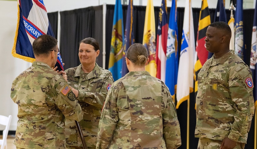 Col. Julie A. Hundertmark assumed command of the U.S. Army Medical Recruiting Brigade during a ceremony conducted at Sadowski Center, Thursday, 25 July.