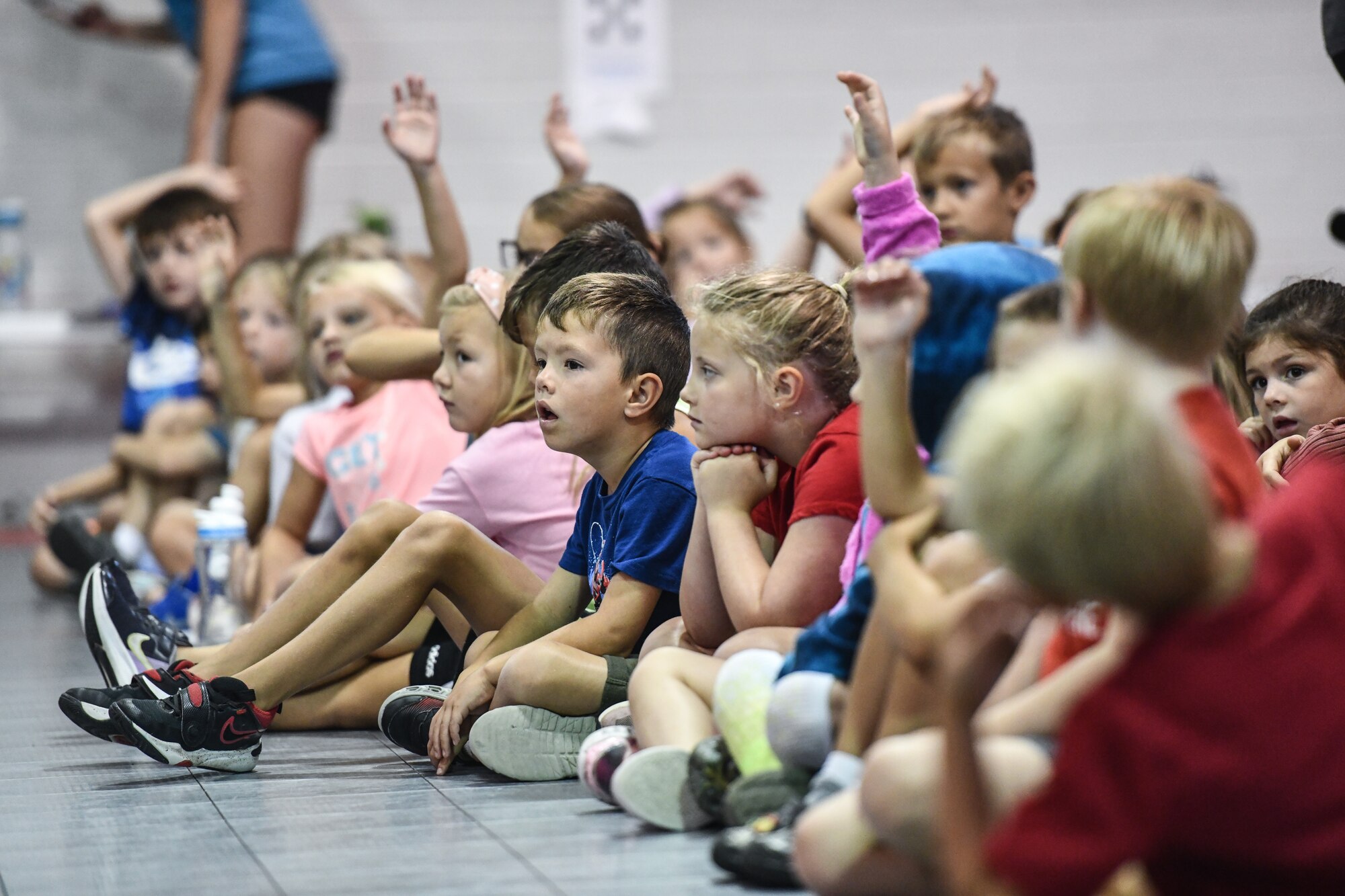 children watch a demonstration