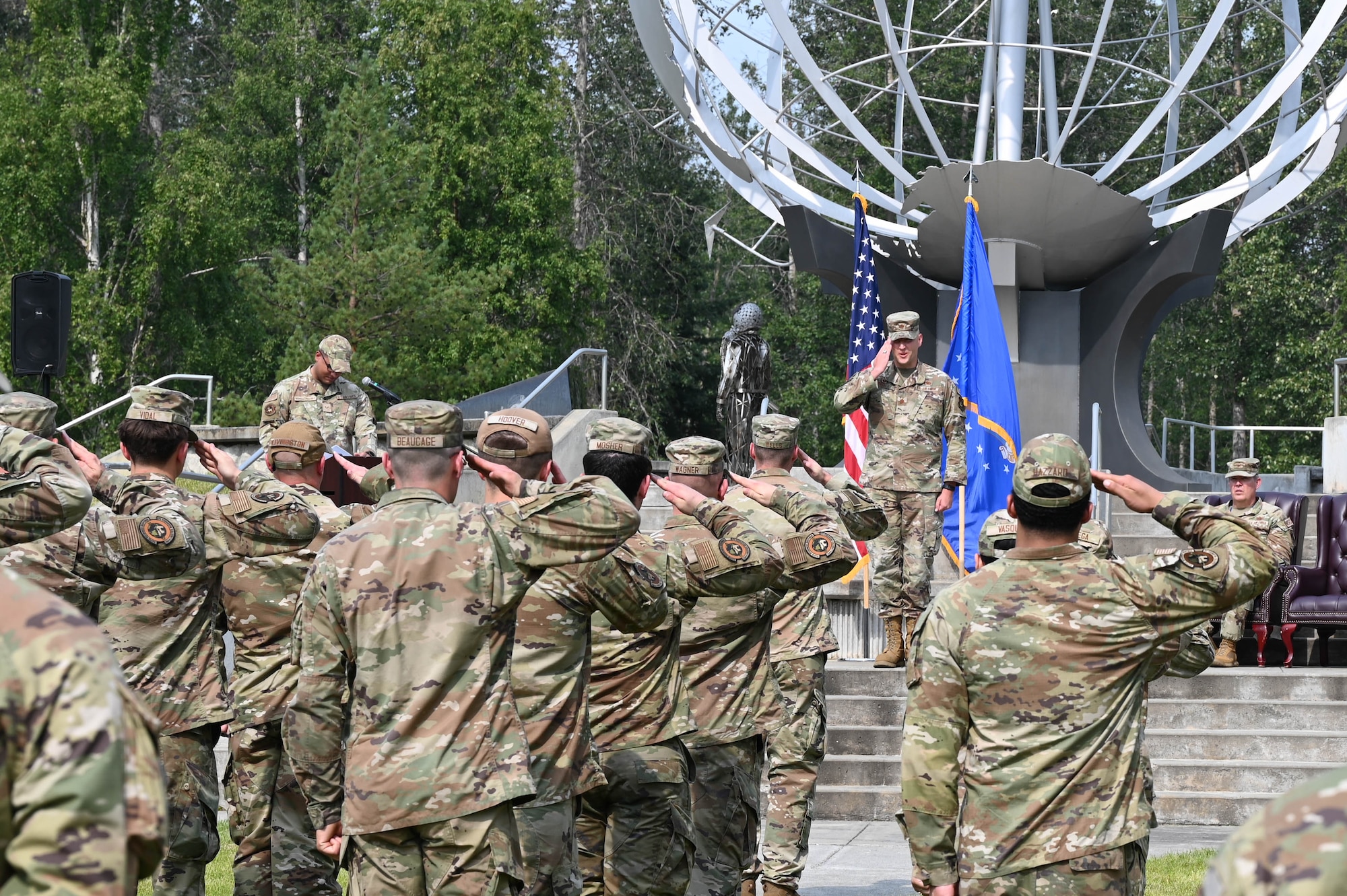 U.S. Air Force Maj. Peter Daigle, 354th LRS incoming commander, renders an initial salute to the flight at the 354th LRS change of command ceremony at Eielson Air Force Base, Alaska, July 24, 2024.