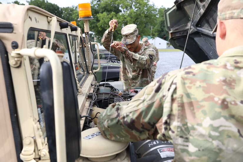 U.S. Soldiers with the 213th Regional Support Group, Pennsylvania National Guard train on the proper care, maintenance and hazards of driving and operating Light Medium Tactical Vehicles, or LMTVs, during an exercise at Fort Indiantown Gap,  Pennsylvania, July 23, 2024.
