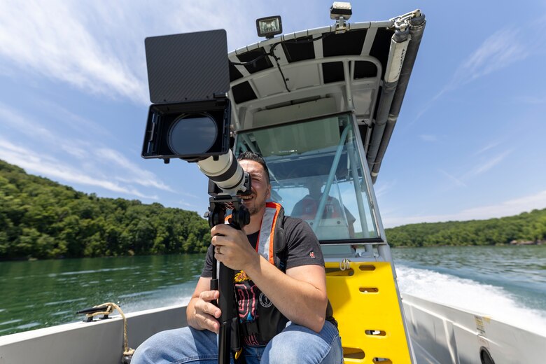 Ryan Campbell, a U.S. Army Corps of Engineers public affairs specialist for the Buffalo District, records video of Summersville Lake during a regional visual storytelling workshop in Summersville, West Virginia, June 26, 2024.