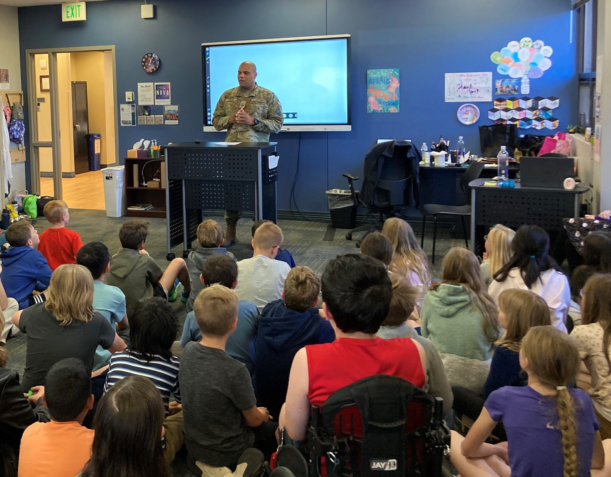 Sgt. Christopher Archer speaks to a class of students.