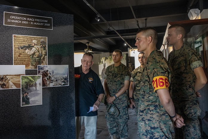 Dan Murray, a docent with the Marine Corps Recruit Depot San Diego Command Museum, gives a tour to new Marines with Hotel Company, 2nd Recruit Training Battalion at MCRD San Diego, California, July 24, 2024. The MCRD Command Museum opened its door in 1987 and is focused on the history of the Marine Corps in the 20th and 21st centuries. (U.S. Marine Corps photo by Cpl. Sarah M. Grawcock)