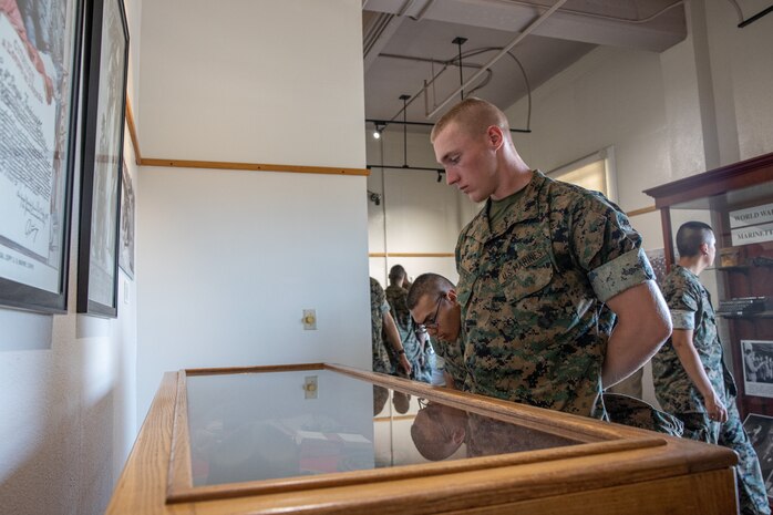 New Marines with Hotel Company, 2nd Recruit Training Battalion, learn about the history of the Marine Corps during their visit to the Marine Corps Recruit Depot San Diego Command Museum, at MCRD San Diego, California, July 24, 2024. The MCRD Command Museum opened its door in 1987 and is focused on the history of the Marine Corps in the 20th and 21st centuries. (U.S. Marine Corps photo by Cpl. Sarah M. Grawcock)