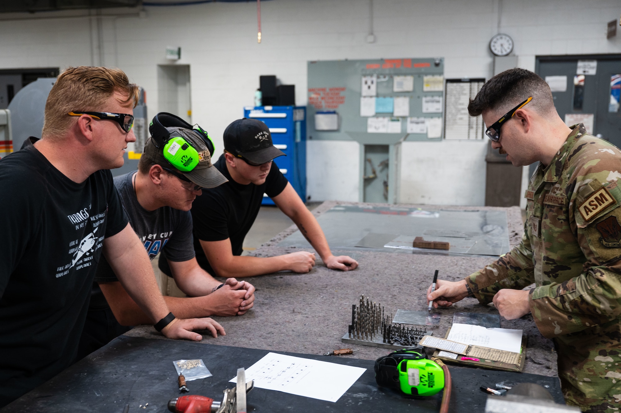 U.S. Airmen assigned to the 55th Electronic
Combat Group and 355th Aircraft
Maintenance Squadron learn techniques for
drilling sheet metal at Davis-Monthan Air
Force Base, Ariz., July 17, 2024. The
students worked with sheet metal during a
Federal Aviation Administration Airframe and
Powerplant certification course. (U.S. Air
Force photo by Airman 1st Class Jasmyne
Bridgers-Matos)