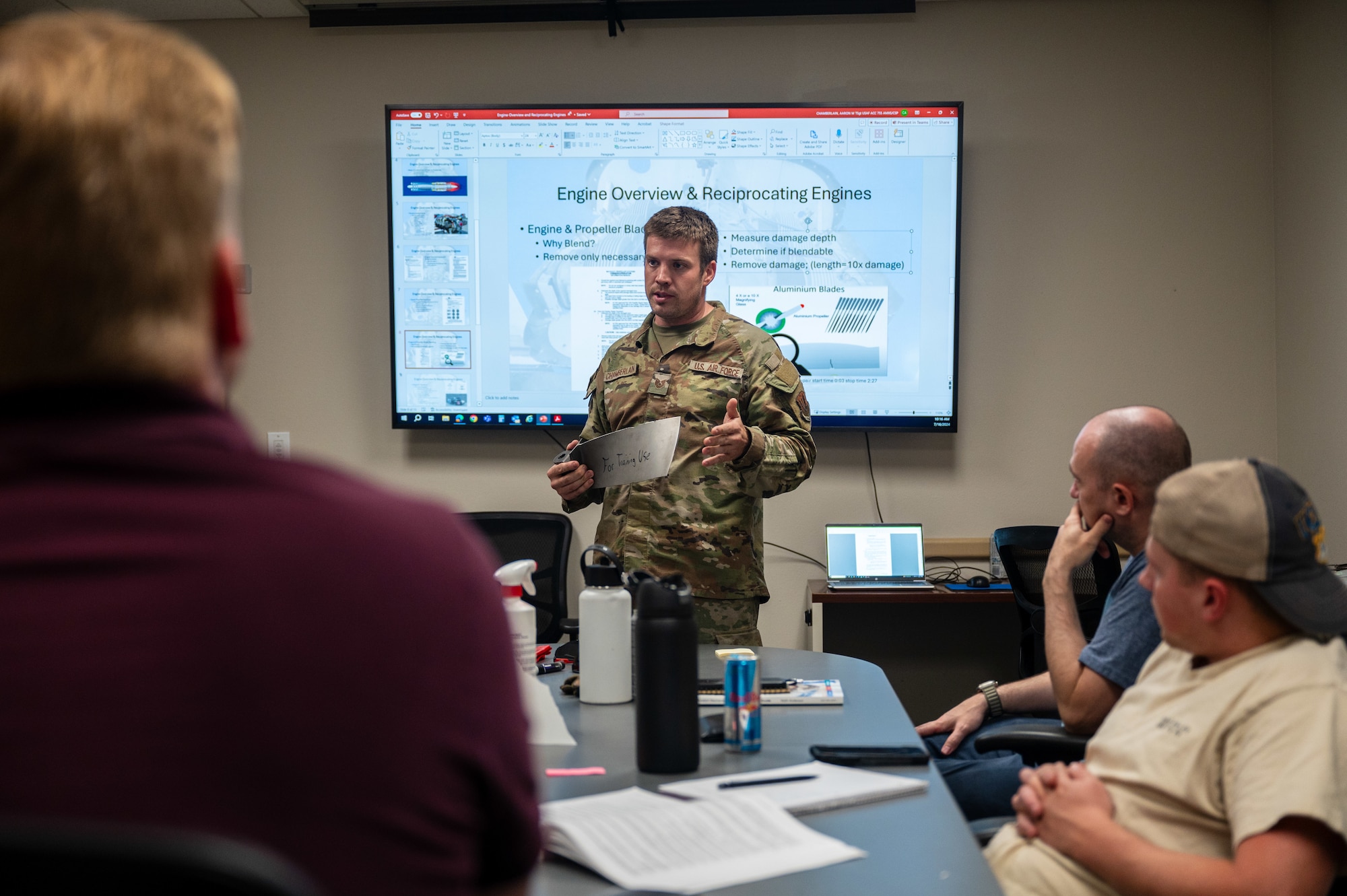 U.S. Air Force Tech. Sgt. Aaron Chamberlain, 355th Aircraft Maintenance Squadron programs flight chief, teaches blade blending during a Federal Aviation Administration Airframe and Powerplant certification course at Davis-Monthan Air Force Base, Ariz., July 17, 2024. Students who attended the course received a specialized certification after the two-week course. (U.S. Air Force photo by Airman 1st Class Jasmyne Bridgers-Matos)