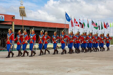 Mongolian Armed Forces soldiers march in ceremonial garb during multi-national exercise Khaan Quest 2024 opening ceremony at Five Hills Training Facility, Mongolia, July 27, 2024.
