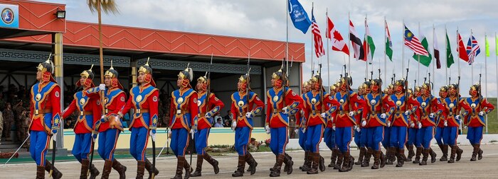 Mongolian Armed Forces soldiers march in ceremonial garb during multi-national exercise Khaan Quest 2024 opening ceremony at Five Hills Training Facility, Mongolia, July 27, 2024.