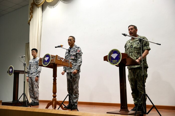 Members of the U.S. Navy, Royal Thai, and Republic of Singapore navies give closing remarks during the closing ceremony of Cooperation Afloat Readiness and Training (CARAT) Thailand 2024.