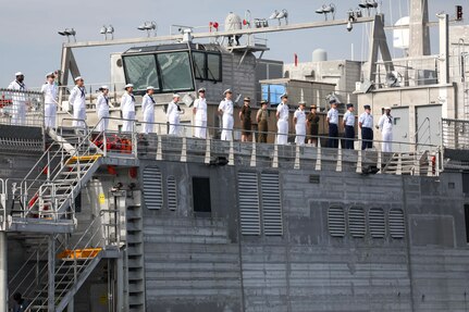 LEGAZPI, Philippines (July 30, 2024) – U.S. Navy Sailors, U.S. Army Soldiers, members of the Australian Defense Force and members of the British Armed Forces, man the rails as the expeditionary fast transport ship USNS City of Bismarck (T-EPF 9) sails into the Port of Legazpi in preparation for the start of Pacific Partnership 24-2 in the Philippines July 30, 2024. Now in its 20th iteration, Pacific Partnership series is the largest annual multinational humanitarian assistance and disaster relief preparedness mission conducted in the Indo-Pacific. Pacific Partnership works collaboratively with host and partner nations to enhance regional interoperability and disaster response capabilities, increase security and stability in the region, and foster new and enduring friendships in the Indo-Pacific. (U.S. Navy photo by Mass Communication Specialist 1st Class Ryan D. McLearnon/Released)