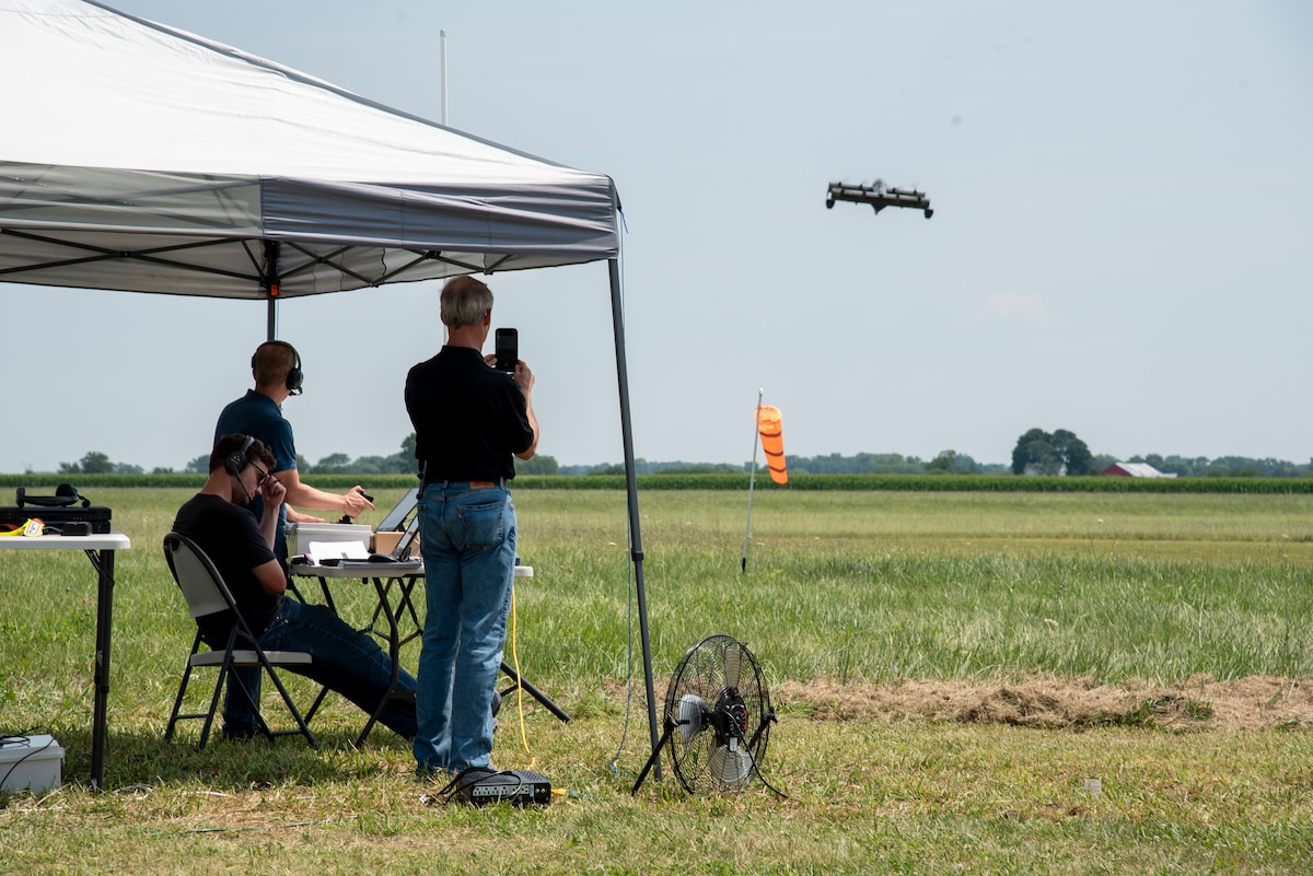 Experts from AFWERX, the Department of the Air Force’s innovation arm within the Air Force Research Laboratory, and Beavercreek, Ohio-based defense contractor Modern Technology Solutions Inc. observe a Pivotal BlackFly electric vertical take-off and landing aircraft test flight at Springfield-Beckley Airport, Ohio, July 12, 2024.