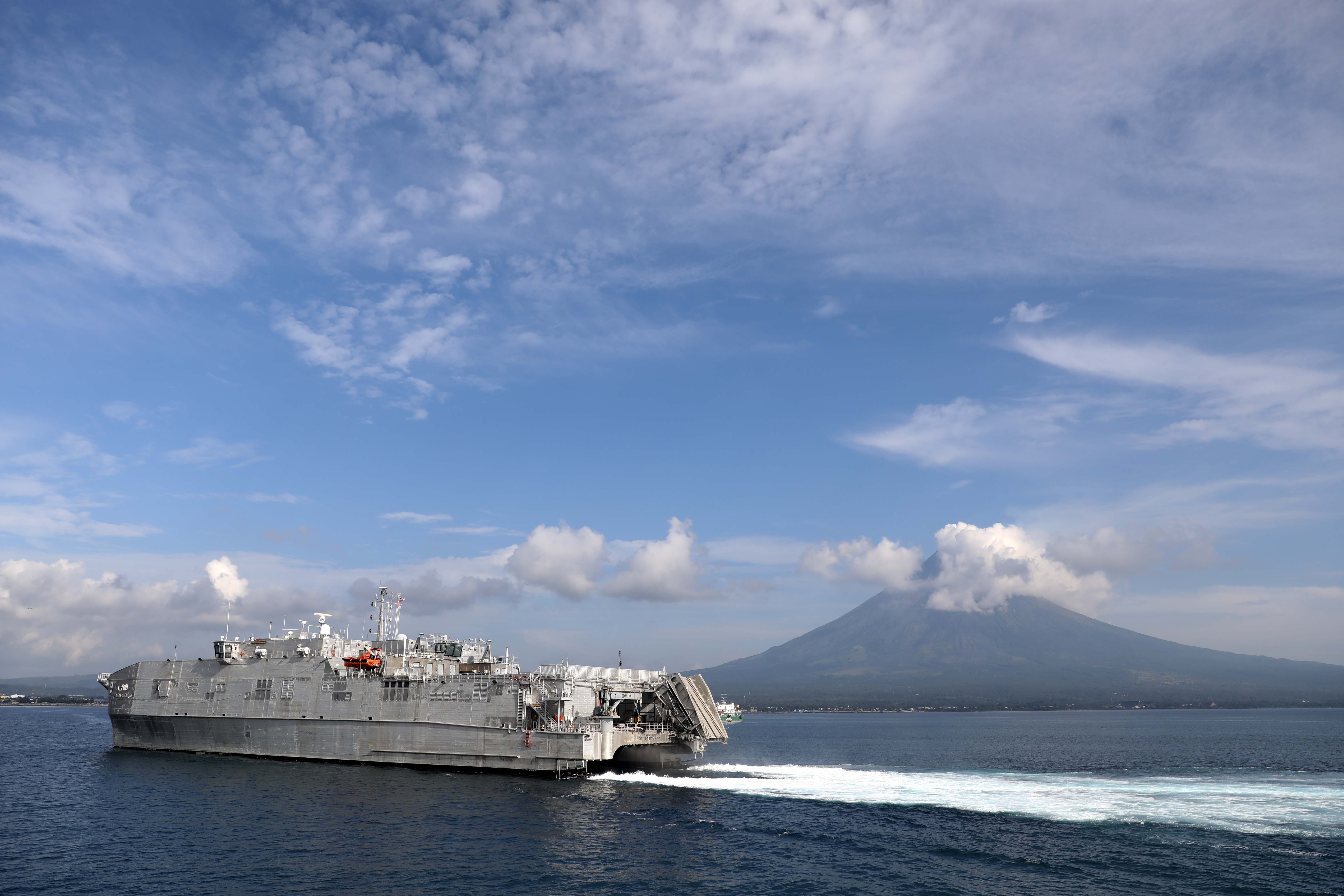 LEGAZPI, Philippines (July 30, 2024) – The expeditionary fast transport ship USNS City of Bismarck (T-EPF 9) sails into the Port of Legazpi in preparation for the start of Pacific Partnership 24-2 in the Philippines July 30, 2024. Now in its 20th iteration, Pacific Partnership series is the largest annual multinational humanitarian assistance and disaster relief preparedness mission conducted in the Indo-Pacific. Pacific Partnership works collaboratively with host and partner nations to enhance regional interoperability and disaster response capabilities, increase security and stability in the region, and foster new and enduring friendships in the Indo-Pacific. (U.S. Navy photo by Mass Communication Specialist 1st Class Ryan D. McLearnon/Released)