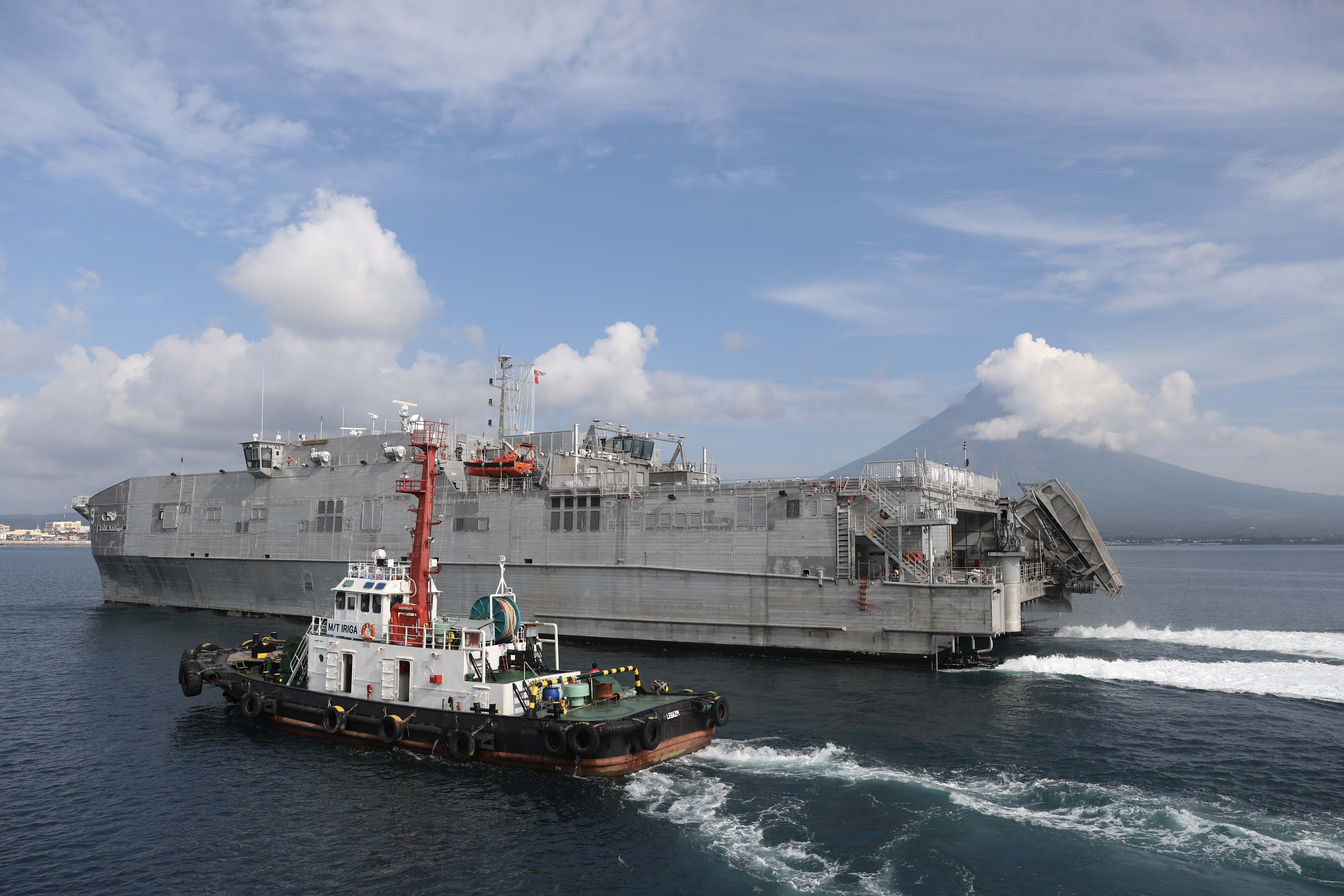 LEGAZPI, Philippines (July 30, 2024) – The expeditionary fast transport ship USNS City of Bismarck (T-EPF 9) sails into the Port of Legazpi in preparation for the start of Pacific Partnership 24-2 in the Philippines July 30, 2024. Now in its 20th iteration, Pacific Partnership series is the largest annual multinational humanitarian assistance and disaster relief preparedness mission conducted in the Indo-Pacific. Pacific Partnership works collaboratively with host and partner nations to enhance regional interoperability and disaster response capabilities, increase security and stability in the region, and foster new and enduring friendships in the Indo-Pacific. (U.S. Navy photo by Mass Communication Specialist 1st Class Ryan D. McLearnon/Released)