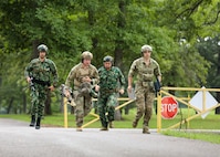 Tennessee Army National Guard Soldiers from team Sneaky Snakes and Bulgaria Team 1 participate in the Unknown Steel Match during Tennessee's Adjutant General Sniper Match on July 28 at Tullahoma's Volunteer Training Site.