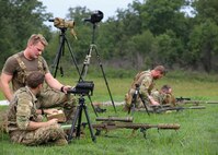 Tennessee Army National Guard Soldiers from team Sneaky Snakes and members of the Montgomery County Sherriff's Department participate in the Range Estimation/ Cold Bore Match during Tennessee's Adjutant General Sniper Match on July 27 at Tullahoma's Volunteer Training Site.