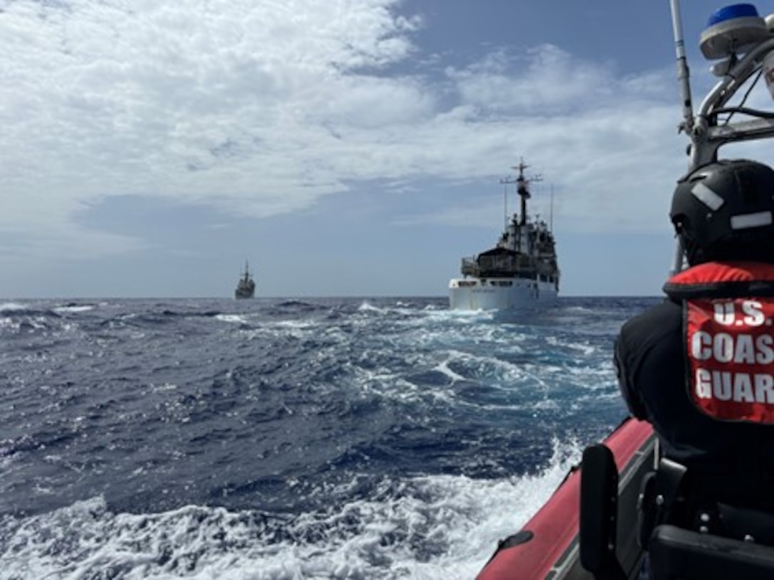 Coast Guard Cutter Forward’s (WMEC 911) small boat crew transits behind Coast Guard Cutter Venturous (WMEC 625), July 15, with Forward in the background, while underway in the Caribbean Sea. Forward conducted a 60-day Caribbean Sea patrol to interdict illegal drugs and apprehend suspected smugglers on the high seas in support of Joint Interagency Task Force – South. (U.S. Coast Guard photo)