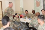 Command Sergeant Major Alexander L. Poutou, Medical Readiness Command, East, visits Ireland Army Health Clinic.