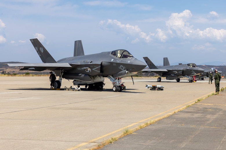 U.S. Marine Corps F-35C Lightning II aircraft assigned to Marine Fighter Attack Squadron (VMFA) 311, Marine Aircraft Group 11, 3rd Marine Aircraft Wing, are staged during a live ordnance training event at the Marine Corps Air Station Miramar combat aircraft loading area, California, July 24, 2024. This was the first time VMFA-311 conducted live ordnance operations independently and a milestone for the squadron, which declared initial operational capability on July 31, 2024. Achieving initial operational capability means that VMFA-311 has the operational F-35C aircraft, trained pilots, maintainers, and support equipment to self-sustain its mission essential tasks. (U.S. Marine Corps photo by Lance Cpl. Jennifer Sanchez)