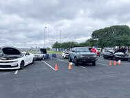 JOINT BASE ANACOSTIA-BOLLING, Washington, D.C. (July 30, 2024) - Strategic Systems Programs (SSP) hosts a car show during its annual command picnic, Tuesday. This year's event for SSP staff and their families included food, games, a dunk tank, and the car show which featured vehicles--old and new--owned by members of the SSP workforce. The picnic was organized by SSP’s Activity and Recreations Committee (SPARC), an all-volunteer team made up of military and civilians who fundraise and plan MWR events throughout the year. SSP is the Navy command that provides cradle-to-grave lifecycle support for the sea-based leg of the nation’s nuclear triad. (U.S. Navy Photo by Lt. Jennifer Bowman/Released)