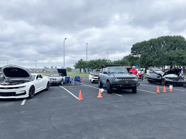 JOINT BASE ANACOSTIA-BOLLING, Washington, D.C. (July 30, 2024) - Strategic Systems Programs (SSP) hosts a car show during its annual command picnic, Tuesday. This year's event for SSP staff and their families included food, games, a dunk tank, and the car show which featured vehicles--old and new--owned by members of the SSP workforce. The picnic was organized by SSP’s Activity and Recreations Committee (SPARC), an all-volunteer team made up of military and civilians who fundraise and plan MWR events throughout the year. SSP is the Navy command that provides cradle-to-grave lifecycle support for the sea-based leg of the nation’s nuclear triad. (U.S. Navy Photo by Lt. Jennifer Bowman/Released)