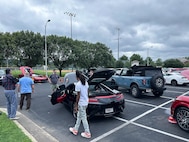 JOINT BASE ANACOSTIA-BOLLING, Washington, D.C. (July 30, 2024) - Strategic Systems Programs (SSP) hosts a car show during its annual command picnic, Tuesday. This year's event for SSP staff and their families included food, games, a dunk tank, and the car show which featured vehicles--old and new--owned by members of the SSP workforce. The picnic was organized by SSP’s Activity and Recreations Committee (SPARC), an all-volunteer team made up of military and civilians who fundraise and plan MWR events throughout the year. SSP is the Navy command that provides cradle-to-grave lifecycle support for the sea-based leg of the nation’s nuclear triad. (U.S. Navy Photo by Lt. Jennifer Bowman/Released)