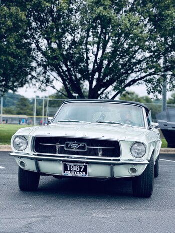 JOINT BASE ANACOSTIA-BOLLING, Washington, D.C. (July 30, 2024) - Tony Hawkins, a Strategic Systems Programs (SSP) employee, pulls his 1968 Mustang into a space for display during a car show which was part of SSP's annual command picnic, Tuesday. This year's event for SSP staff and their families included food, games, a dunk tank, and the car show which featured vehicles--old and new--owned by members of the SSP workforce. The picnic was organized by SSP’s Activity and Recreations Committee (SPARC), an all-volunteer team made up of military and civilians who fundraise and plan MWR events throughout the year. SSP is the Navy command that provides cradle-to-grave lifecycle support for the sea-based leg of the nation’s nuclear triad. (U.S. Navy Photo by Lt. Jennifer Bowman/Released)