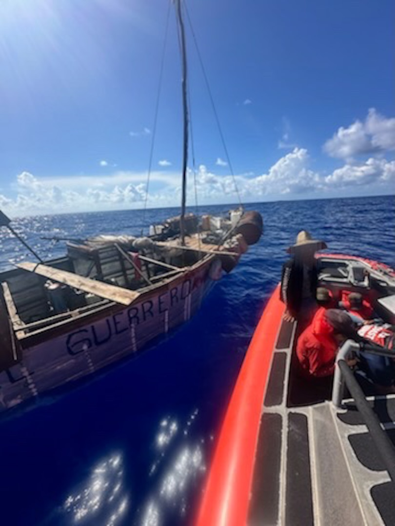 Law enforcement boat crews from Coast Guard Station Islamorada intercept a rustic vessel attempting an illegal migrant voyage, 41 miles southeast of Long Key, Florida, July 26, 2024. The individuals aboard the vessel were repatriated back to Cuba on July 31, 2024. (U.S. Coast Guard photo)