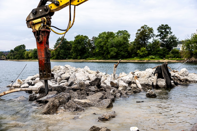 Contractors for the U.S. Army Corps of Engineers Pittsburgh District use various floating barges to drill, demolish and remove the fixed-crest dam at the Monongahela River Locks and Dam 3 in Elizabeth, Pennsylvania, July 29, 2024.