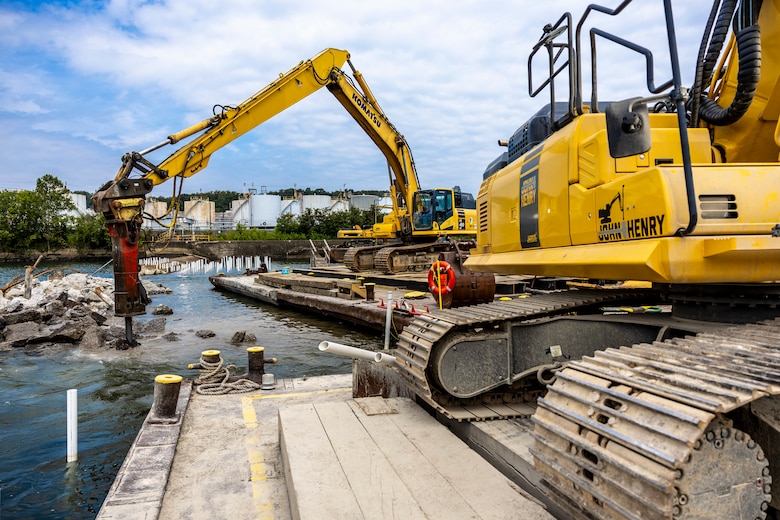 Contractors for the U.S. Army Corps of Engineers Pittsburgh District use various floating barges to drill, demolish and remove the fixed-crest dam at the Monongahela River Locks and Dam 3 in Elizabeth, Pennsylvania, July 29, 2024.