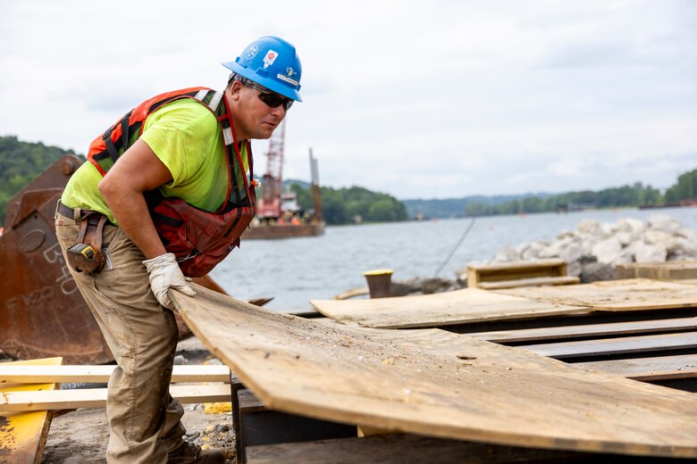 Contractors for the U.S. Army Corps of Engineers Pittsburgh District use various floating barges to drill, demolish and remove the fixed-crest dam at the Monongahela River Locks and Dam 3 in Elizabeth, Pennsylvania, July 29, 2024.