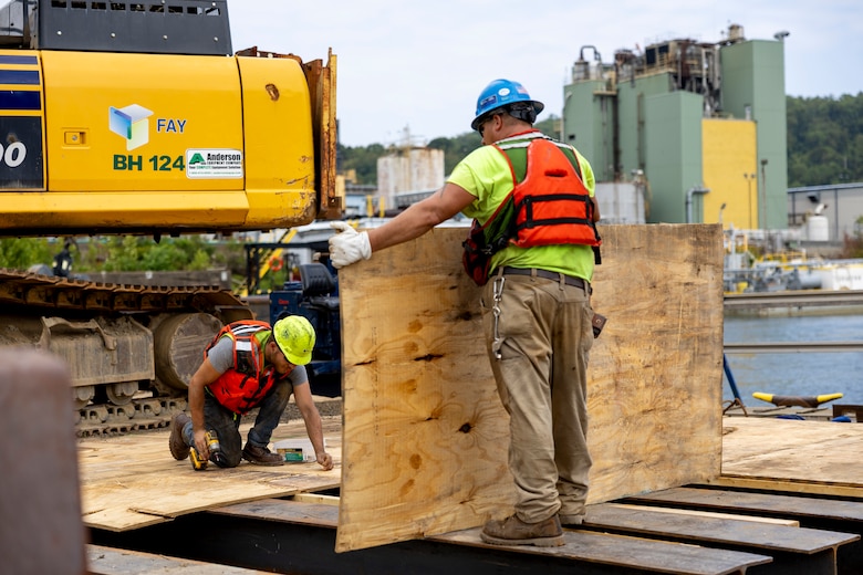 Contractors for the U.S. Army Corps of Engineers Pittsburgh District use various floating barges to drill, demolish and remove the fixed-crest dam at the Monongahela River Locks and Dam 3 in Elizabeth, Pennsylvania, July 29, 2024.